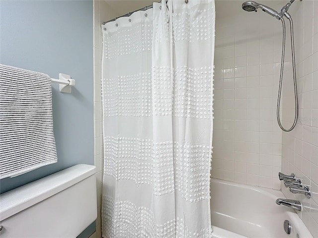 bathroom featuring shower / bathtub combination with curtain