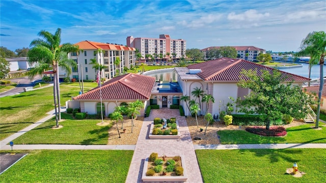 bird's eye view with a water view