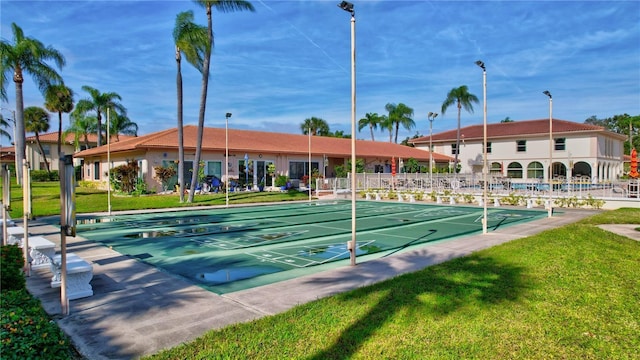 view of community with a lawn