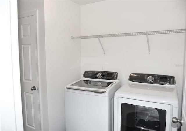 laundry area featuring separate washer and dryer