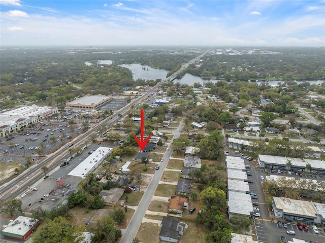 drone / aerial view with a water view