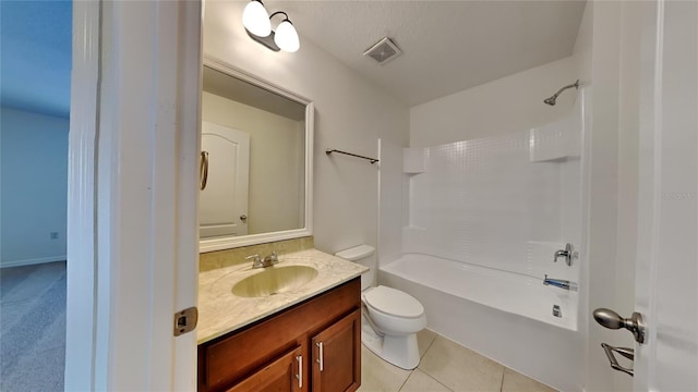 full bathroom with tile patterned flooring, vanity, tub / shower combination, and toilet