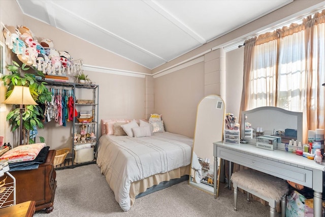 bedroom featuring carpet flooring and vaulted ceiling