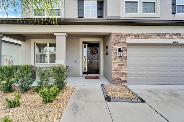 property entrance with a garage