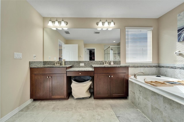 bathroom featuring plus walk in shower and vanity