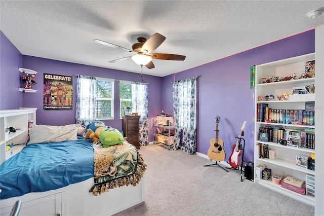 bedroom with light carpet, a textured ceiling, and ceiling fan