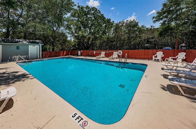 view of pool featuring a patio area