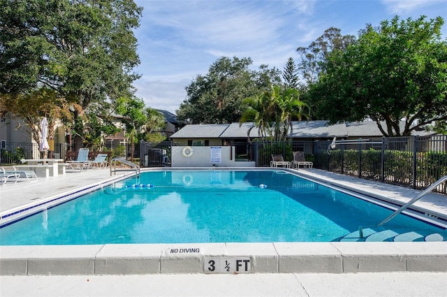 view of pool with a patio area