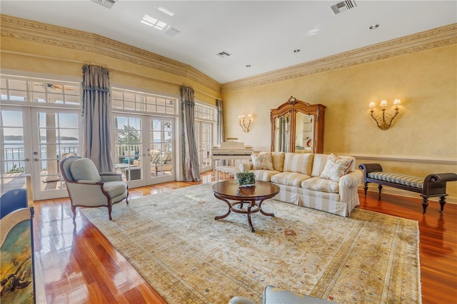 living room featuring french doors and hardwood / wood-style floors