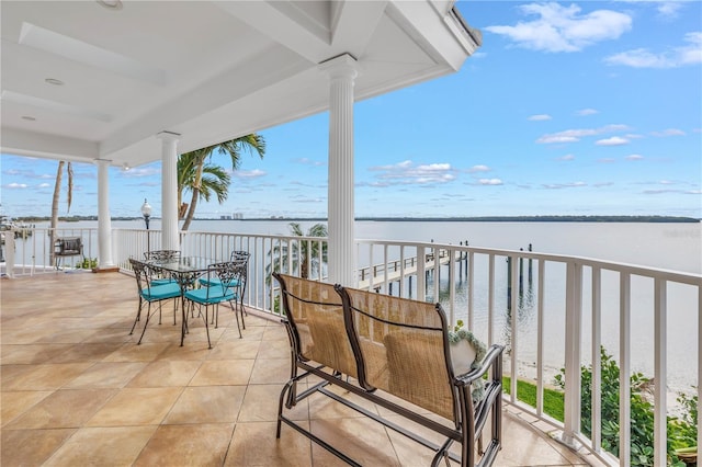 balcony featuring a water view