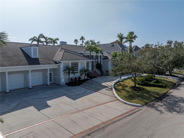 view of front of property with a garage