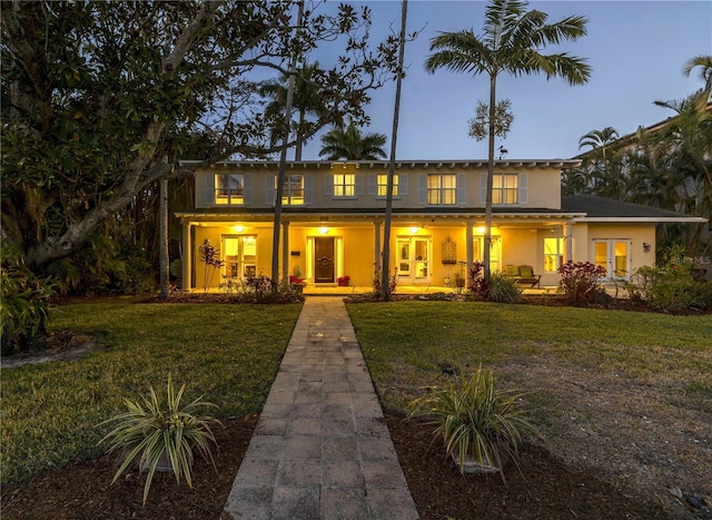 view of front of house featuring a lawn