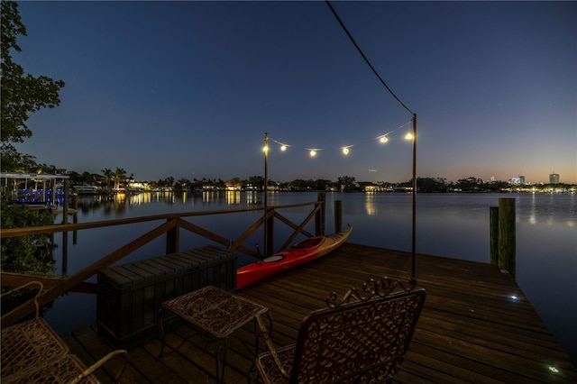 dock area featuring a water view