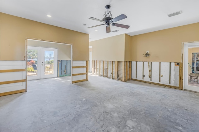 empty room with french doors and ceiling fan