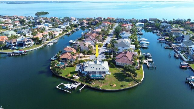 aerial view with a residential view and a water view