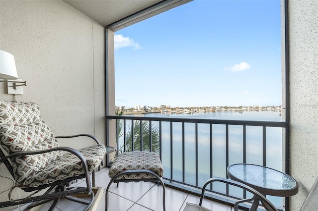 balcony featuring a water view