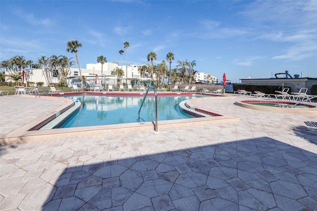 view of pool featuring a patio