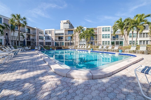 view of swimming pool featuring a patio area