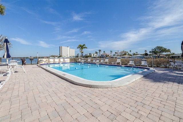 view of pool featuring a patio