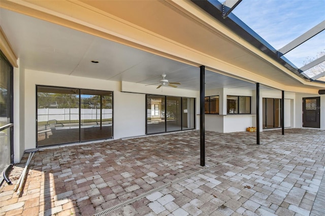 view of patio with ceiling fan