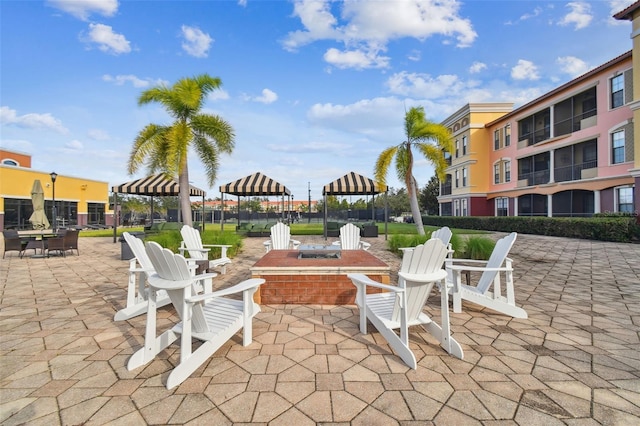 view of patio / terrace with a gazebo and an outdoor fire pit