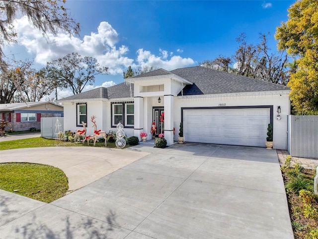 view of front of property with a garage