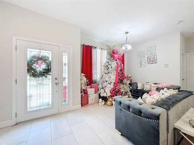 tiled entrance foyer featuring plenty of natural light