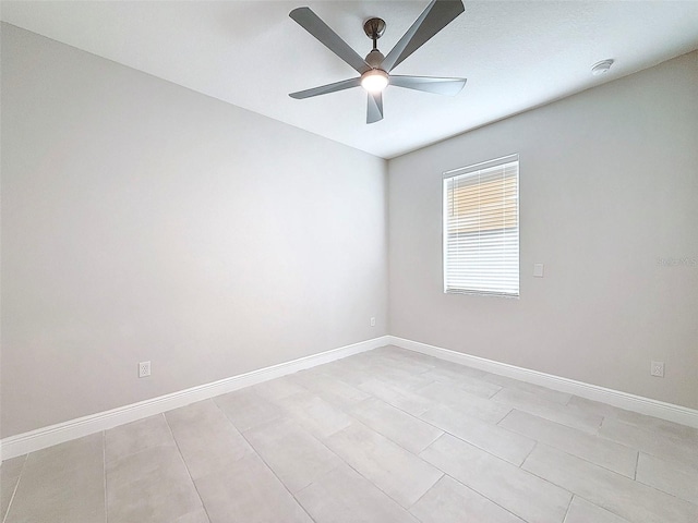 empty room featuring ceiling fan