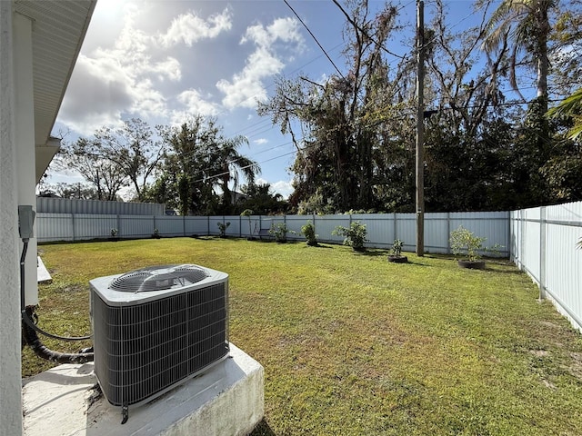 view of yard featuring central air condition unit