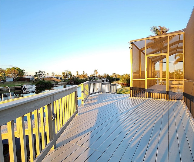 deck featuring a water view