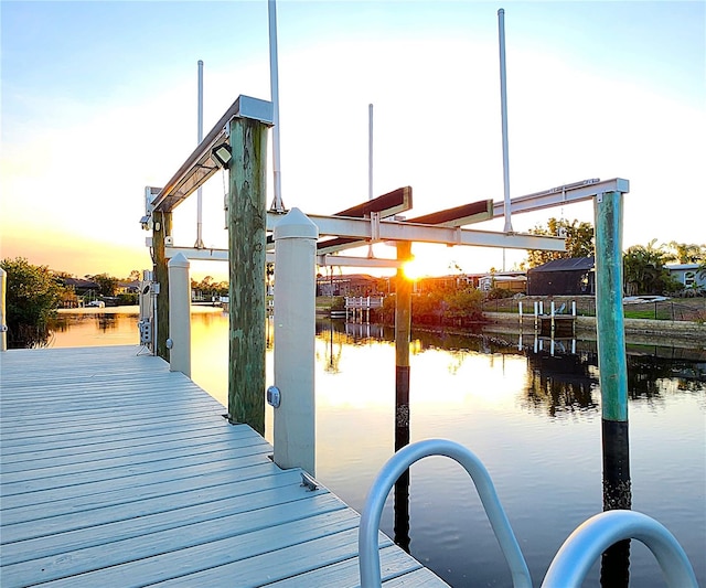 dock area featuring a water view