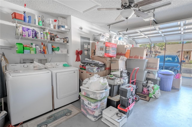 laundry room featuring separate washer and dryer, ceiling fan, and a textured ceiling