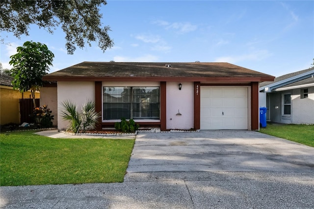 ranch-style home featuring a front yard