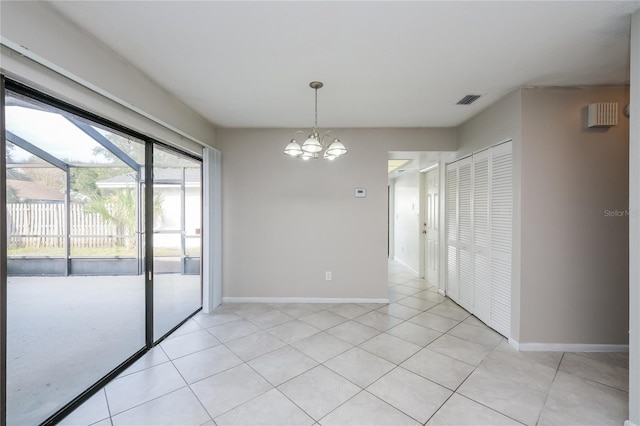 unfurnished dining area with light tile patterned floors and a notable chandelier