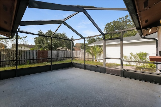 unfurnished sunroom with a wealth of natural light