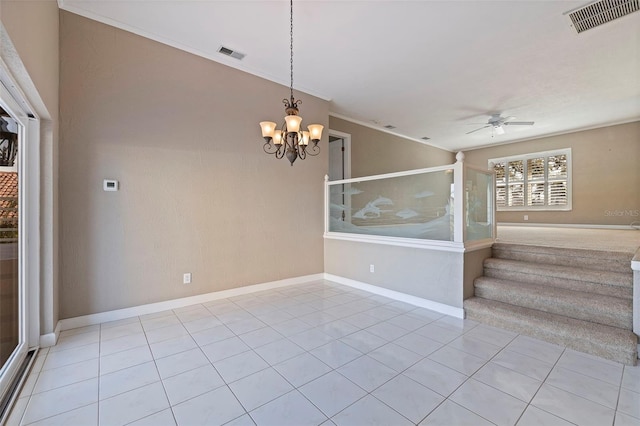 tiled empty room with crown molding and ceiling fan with notable chandelier