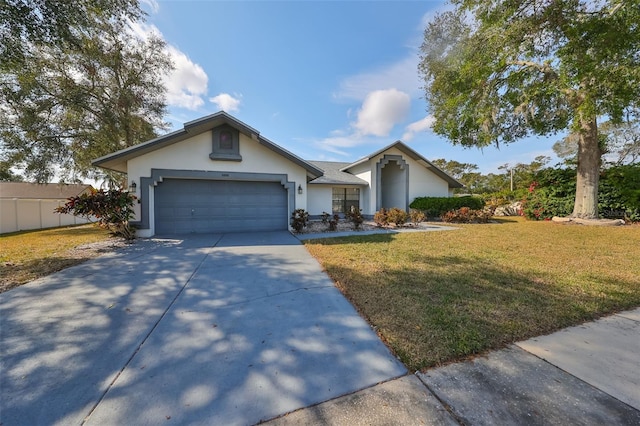 single story home featuring a front yard and a garage