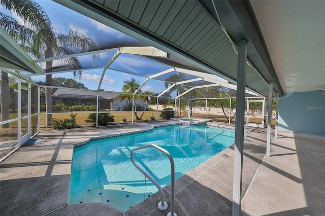 view of pool featuring glass enclosure and a patio area