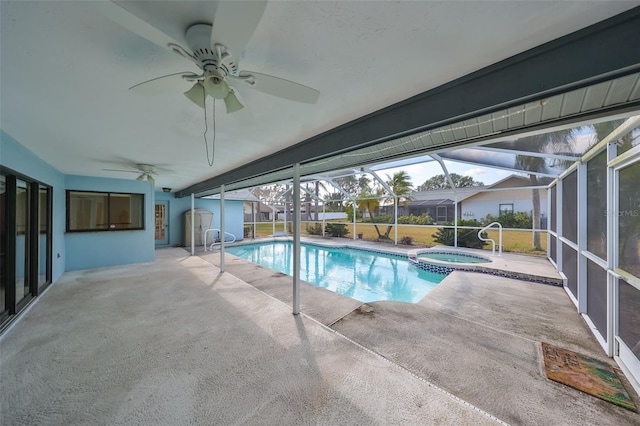 view of swimming pool with an in ground hot tub, a patio, ceiling fan, and a lanai