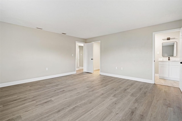 empty room featuring light wood-type flooring