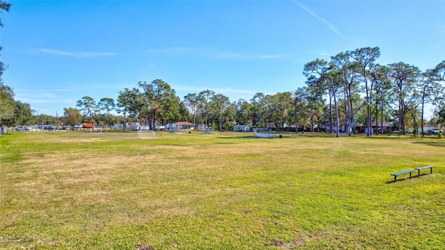 view of home's community with a lawn