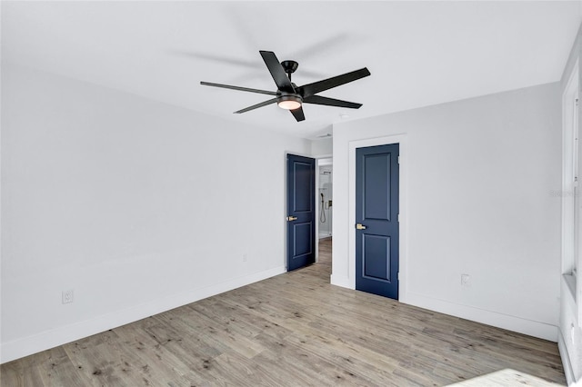 unfurnished bedroom featuring ceiling fan and light hardwood / wood-style flooring