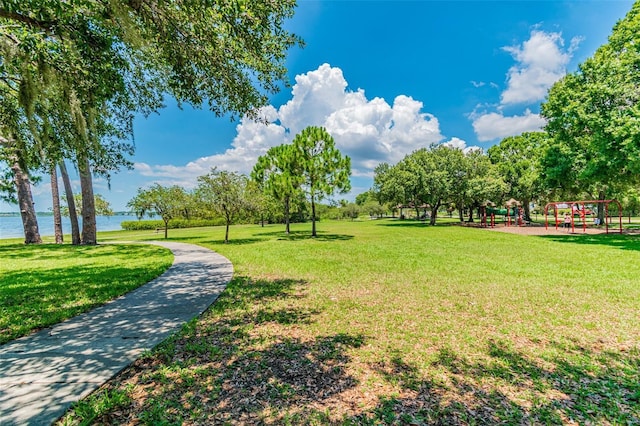 102 Shore Dr E, Oldsmar, FL 34677 - view of home's community featuring a yard and a water view