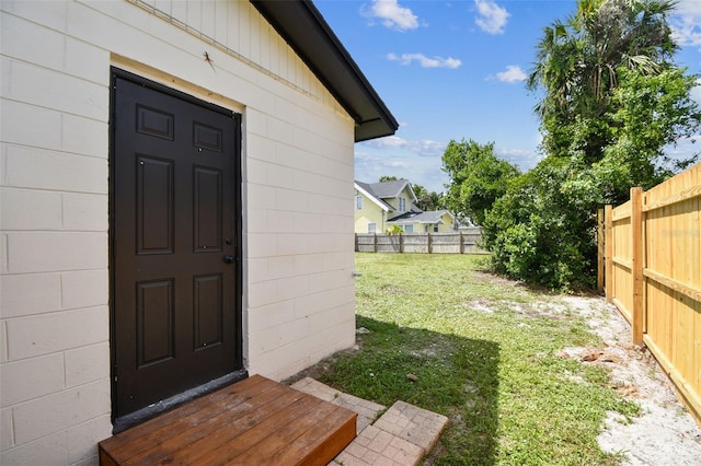 102 Shore Dr E, Oldsmar, FL 34677 - property entrance with concrete block siding