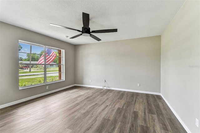 102 Shore Dr E, Oldsmar, FL 34677 - unfurnished room featuring wood finished floors, a ceiling fan, and a textured ceiling