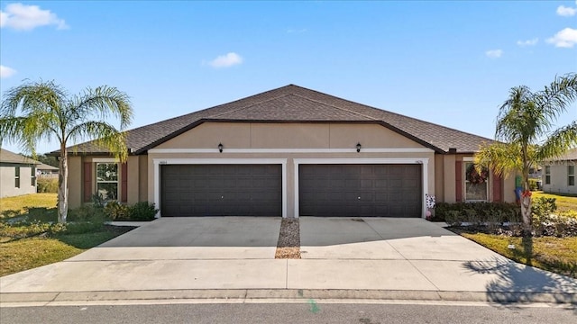 ranch-style home with a garage