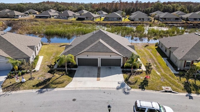 bird's eye view with a water view