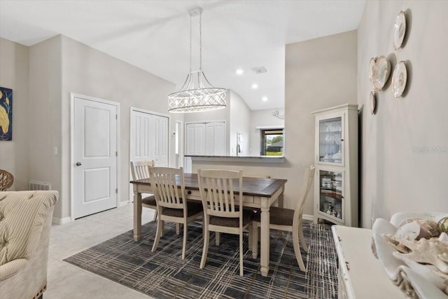 dining space with light tile patterned floors