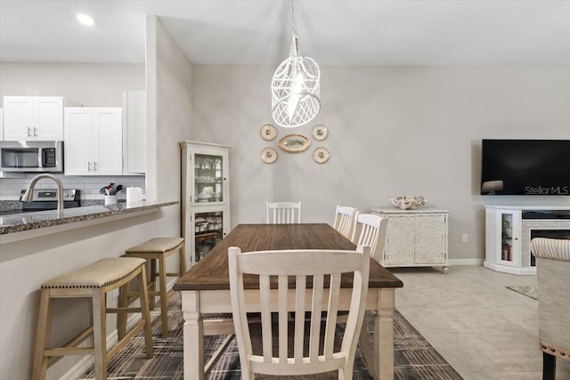 view of tiled dining area