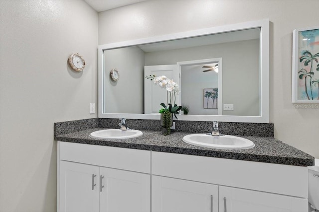 bathroom featuring vanity and ceiling fan